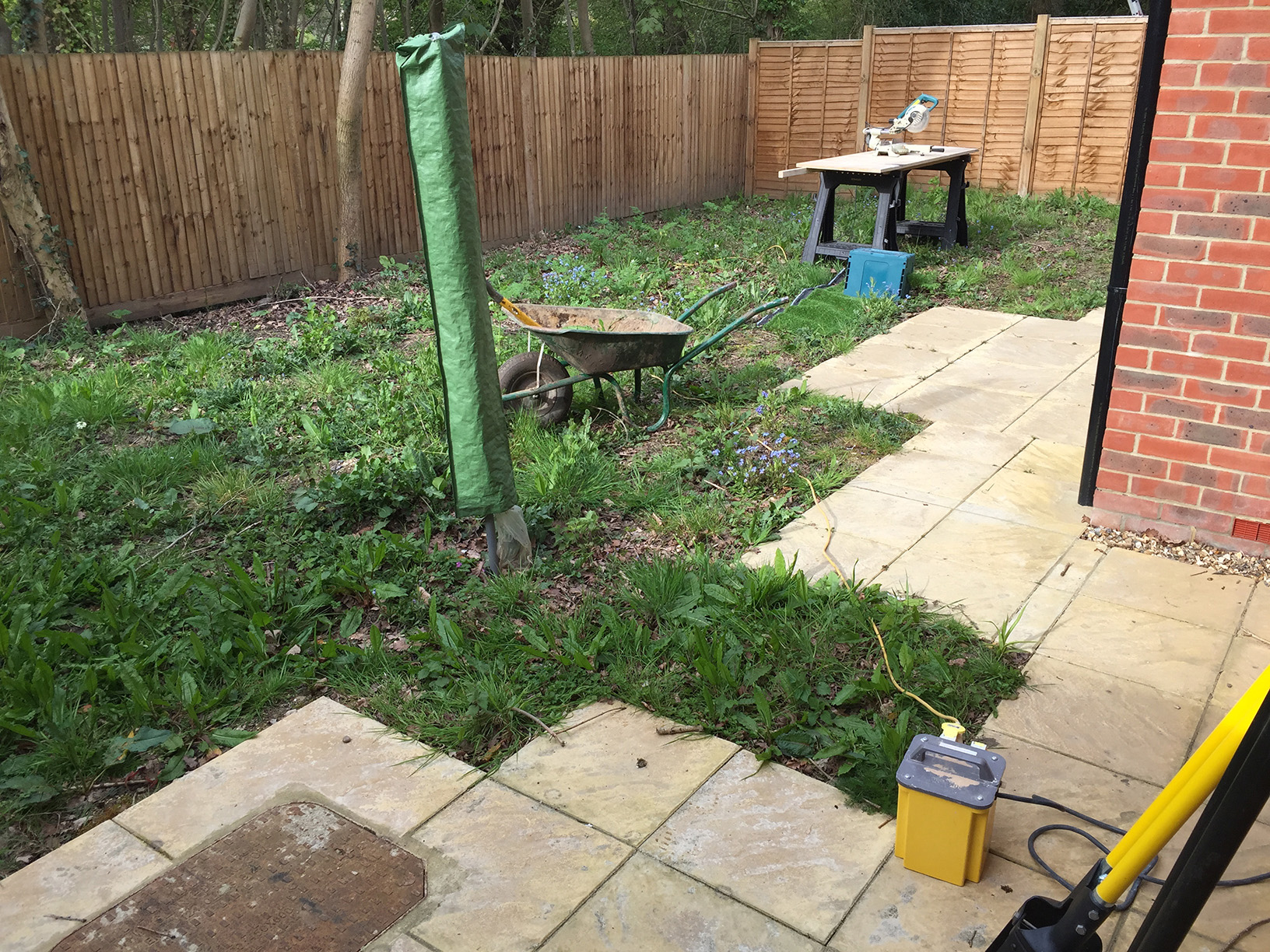 Artificial lawn and timber decking installation