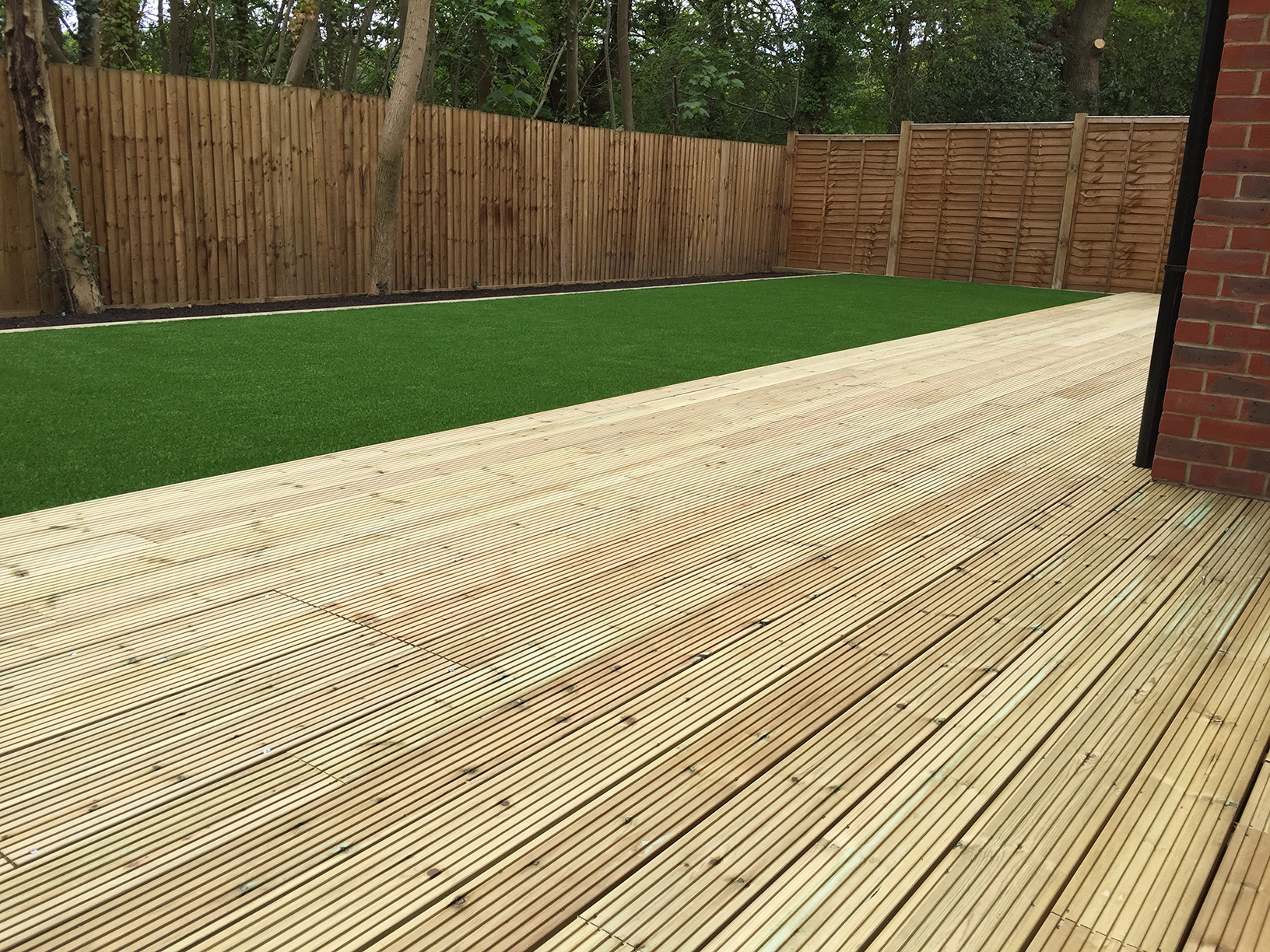 Decking boards being laid